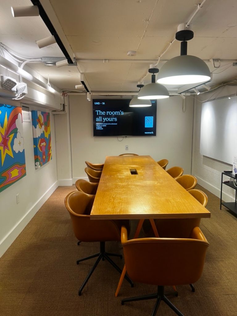 WeWork classroom training room with conference table