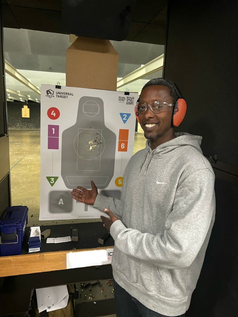 Student presenting a target after range practice